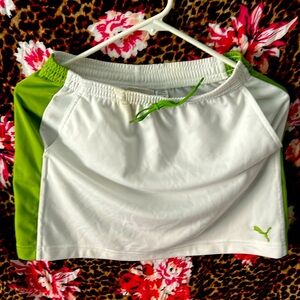 Puma short tennis skirt, mostly white with green on the side
